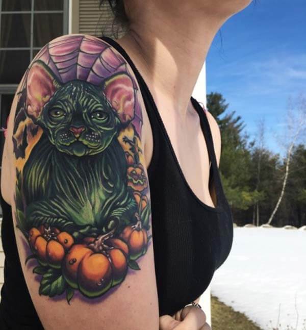 eye-catchy and mind blowing cat tattoo design on shoulder for Girls