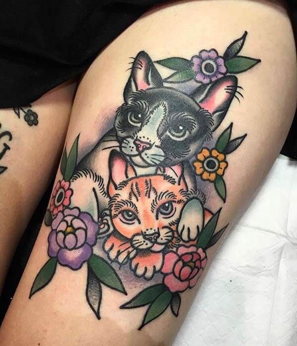 attractive and cute cat tattoo design on thigh for Girls