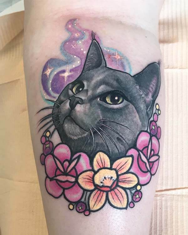 magical cat tattoo design on leg for girls and ladies who love cats