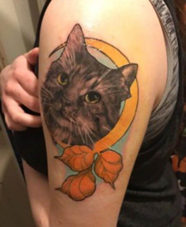 cat lover’s shoulder tattoo on cat design is irresistible and head turner