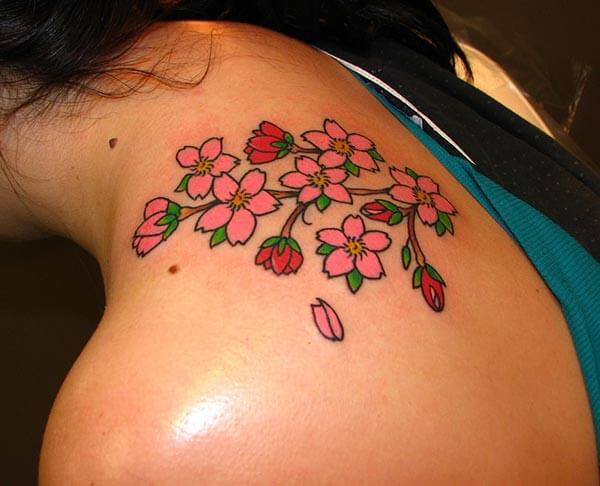 Pretty cherry blossom tattoo design on shoulder for Women