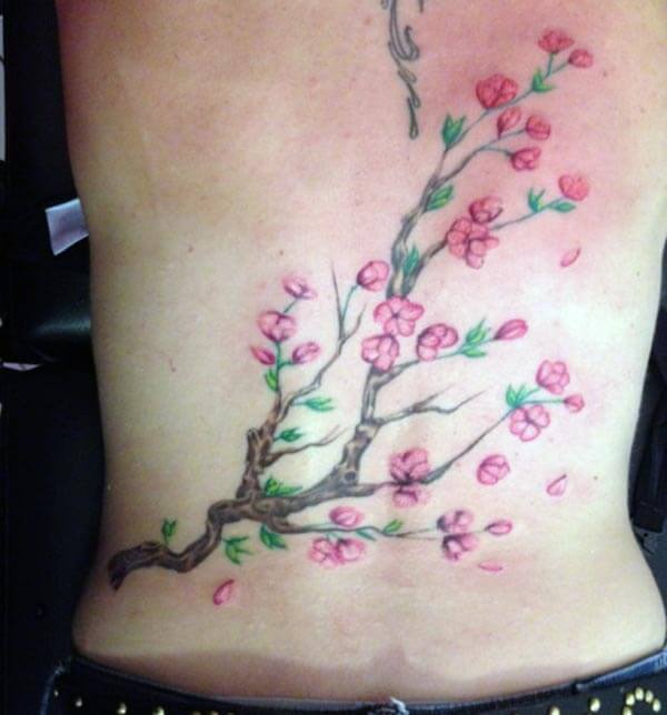 amazing cherry blossom tattoo design on back for ladies