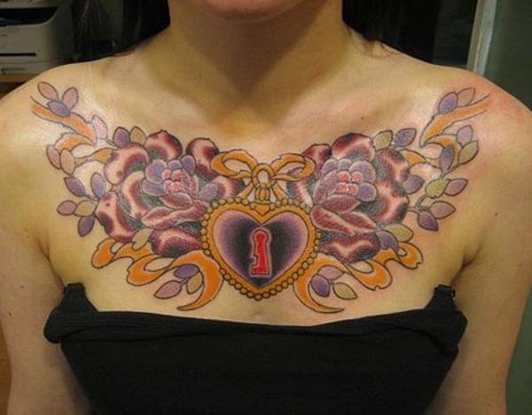 striking heart shaped lock chest tattoo design for girls
