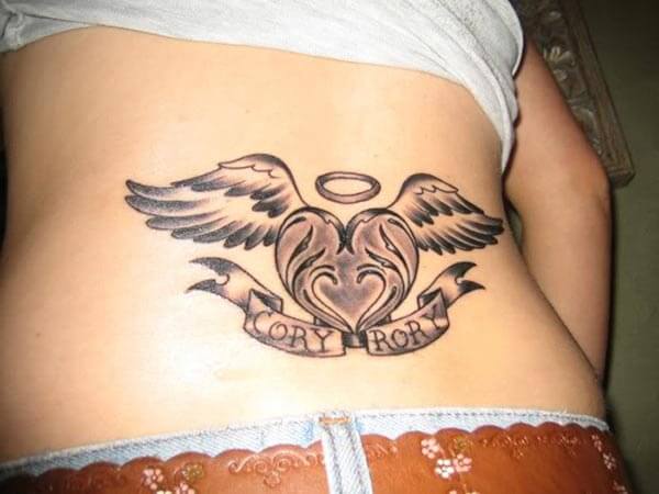 lovely heart with spread wings RIP tattoo design on lower back for ladies