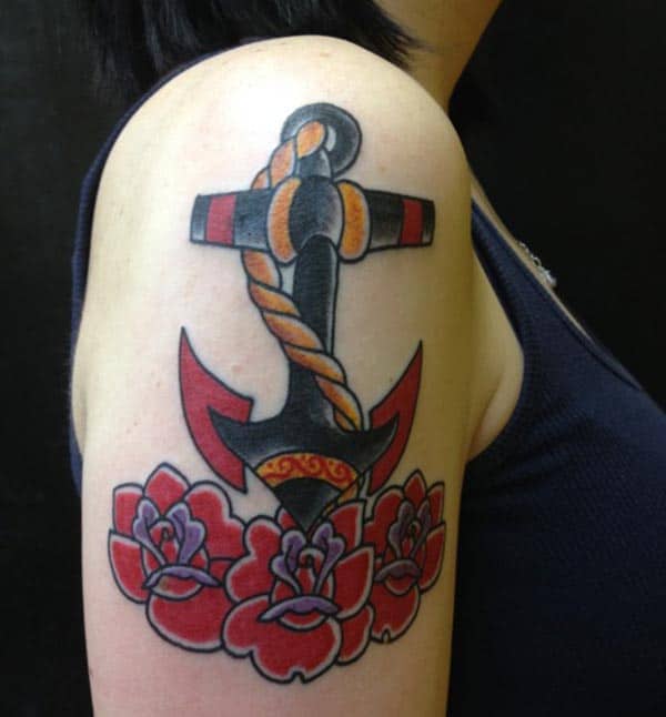 anchor with red flowers tattoo ideas on arm for girls 