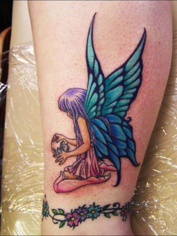 Stunning vibrant angel tattoo ideas on leg for women