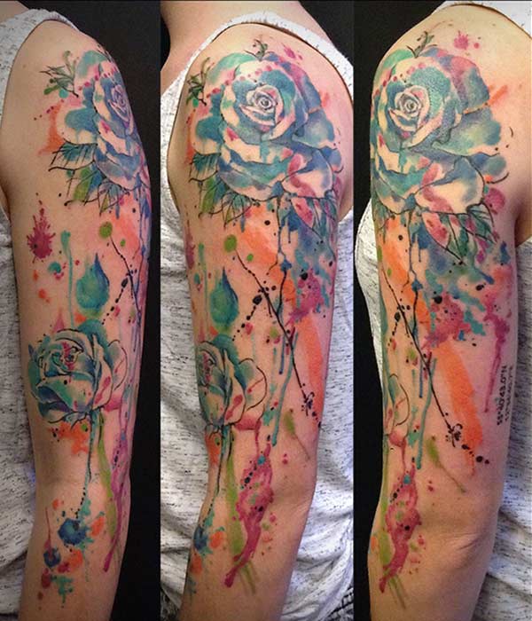 Eye-catchy vivid coloured floral arm tattoo ideas for girls 