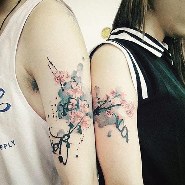 A striking couple tattoo design on shoulder for lovers