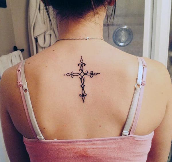 An elegant cross tattoo design on back for Girls and women
