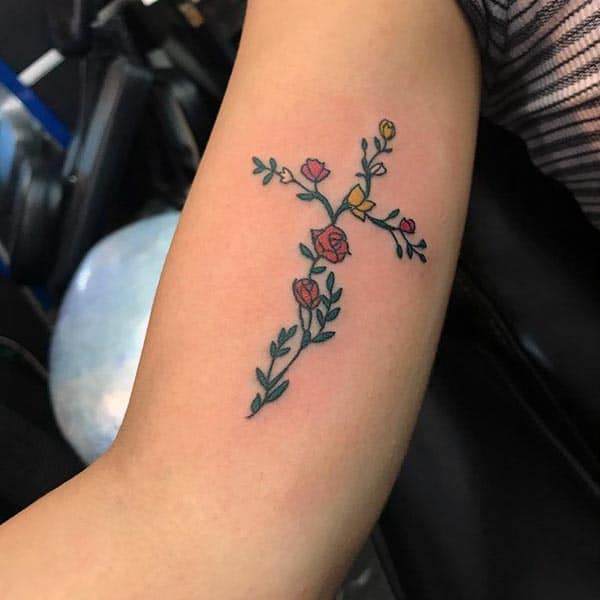 A lovely cross tattoo design on inner arm for Girls