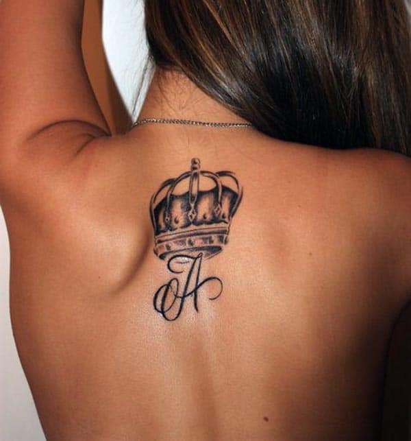A royal crown tattoo design back for ladies