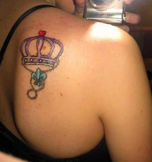 A beautiful crown tattoo design on back shoulder for girls