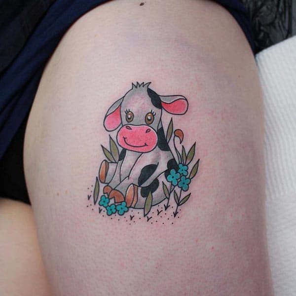 Extremely adorable cute calf tattoo design on thigh for Ladies