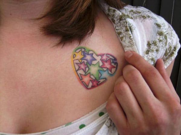 A charming cute heart tattoo design on front shoulder for girls