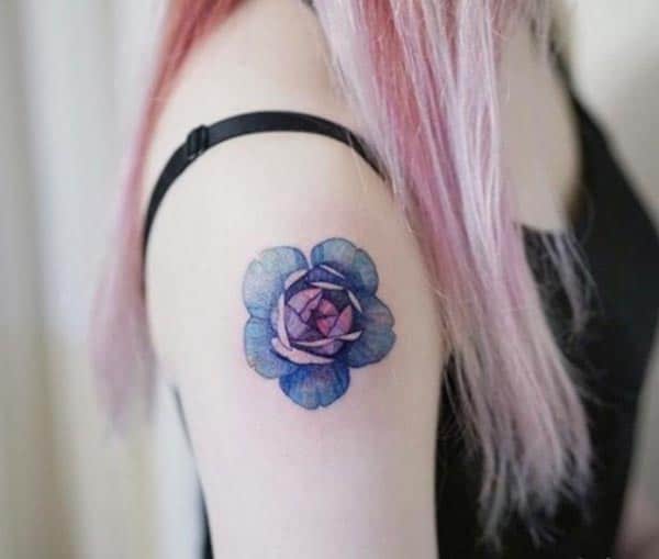 An impressive floral tattoo design on shoulder for ladies and girls