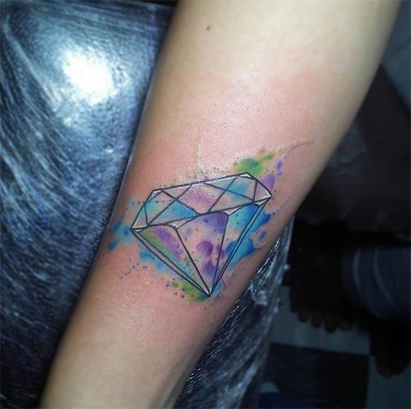 Awesome watercolor diamond tattoo design on forearm for Girls