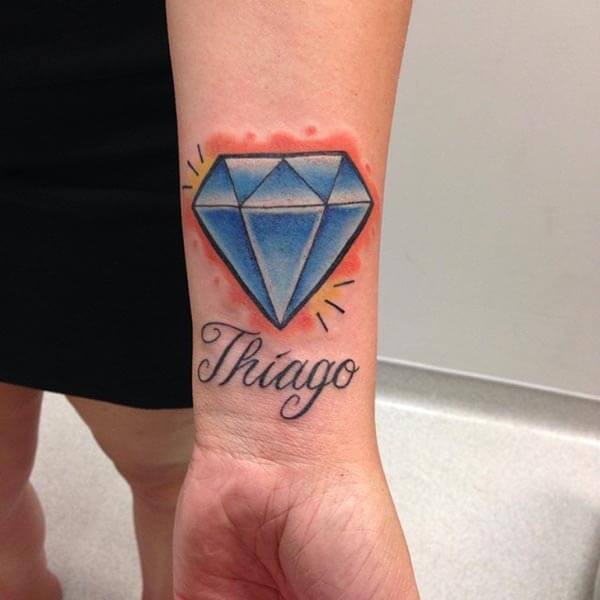 An attractive blue diamond with name on wrist for Girls