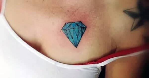 A lovely cute blue diamond tattoo on chest for Girls and Women