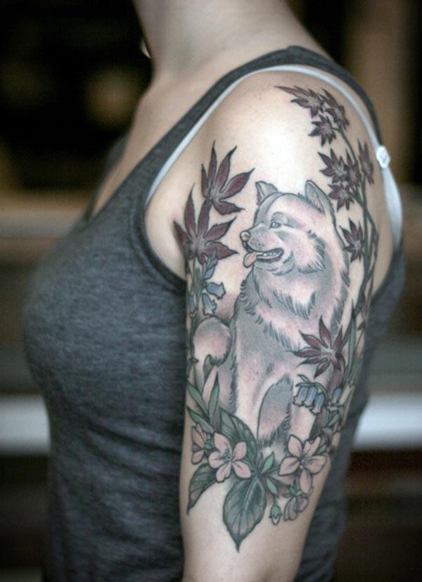 A breathtaking dog tattoo design on shoulder for Ladies
