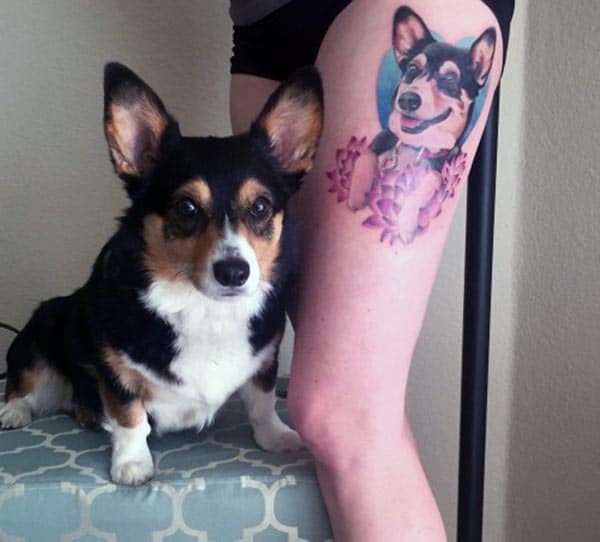 A killer adorable dog tattoo design on side thigh for Women