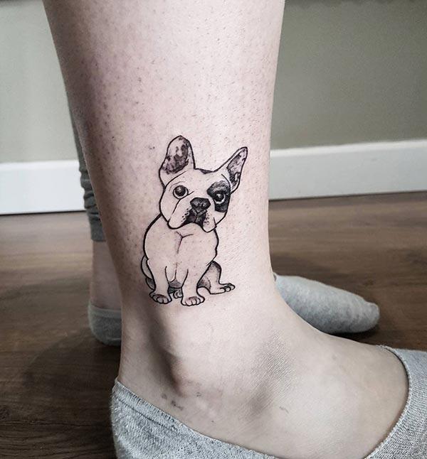 Awesome little dog tattoo design on ankle for Ladies