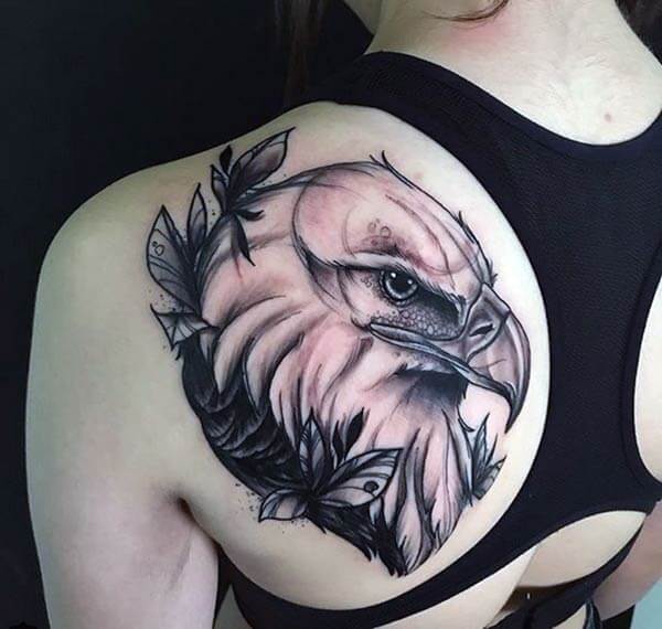 A ravishing eagle head tattoo design on back shoulder for Ladies