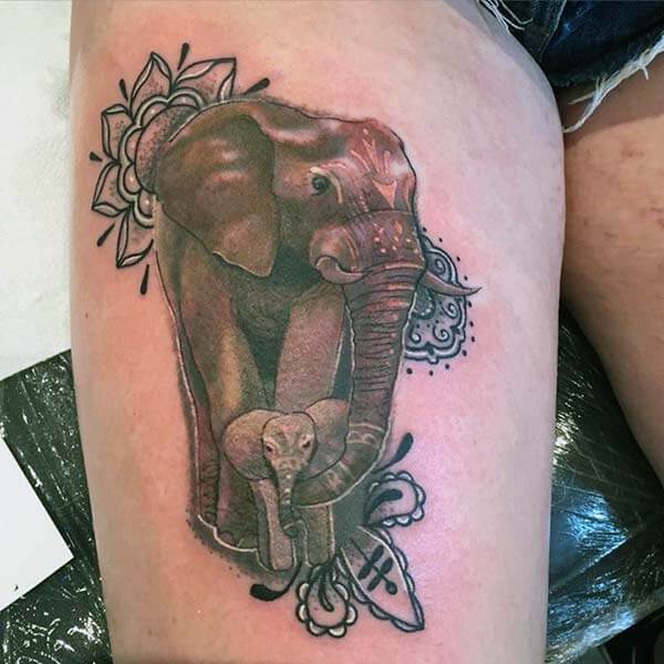 An aesthetic elephant tattoo design on thigh for Girls and women