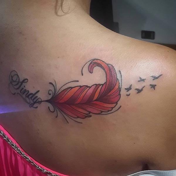 A delightful feather tattoo design on side shoulder for Girls and Women