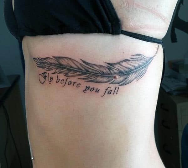 Awesome feather tattoo design on side rib for Girls and women