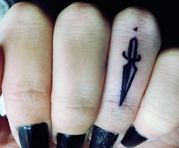 A charming finger tattoo design for Women