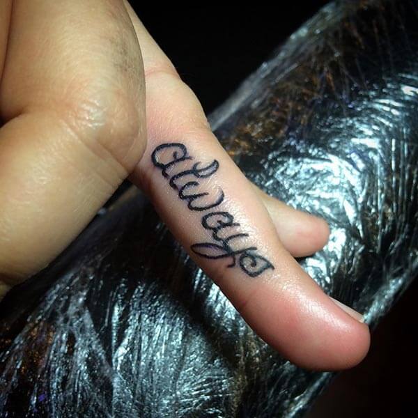 A creative finger tattoo design for Girls