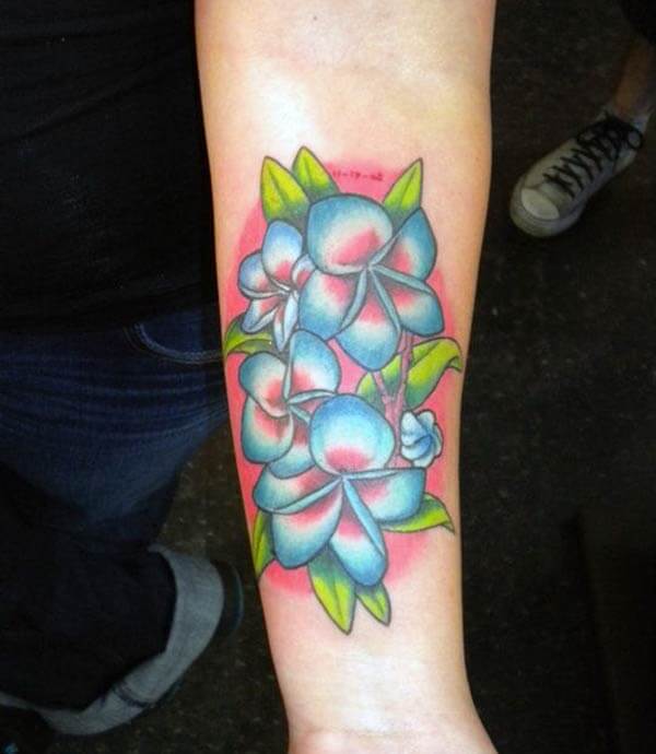 An attractive flower tattoo design on forearm for Girls