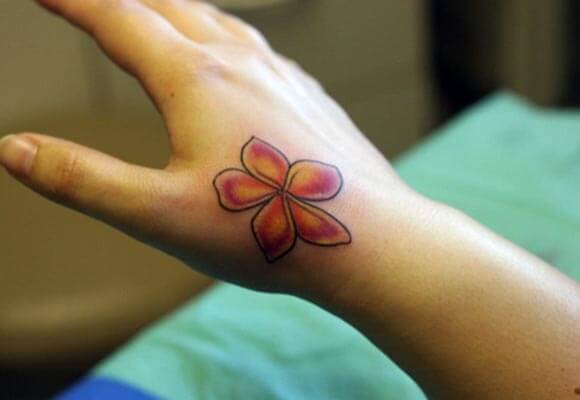 A simple lovely hand tattoo design for women