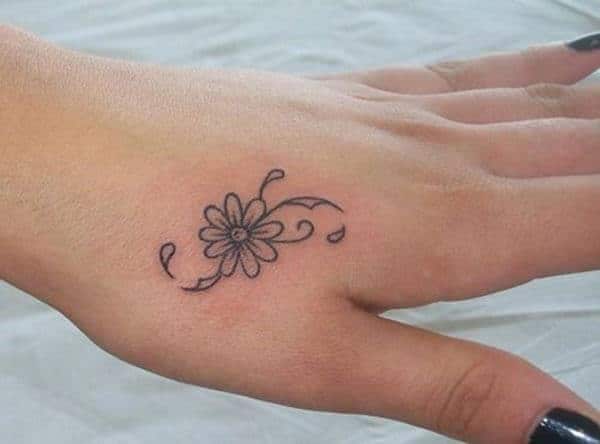 An adorable hand tattoo design for women