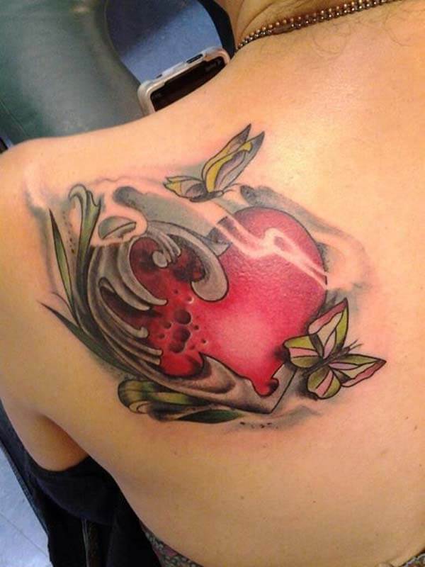 A marvelous heart tattoo design on back shoulder for Women