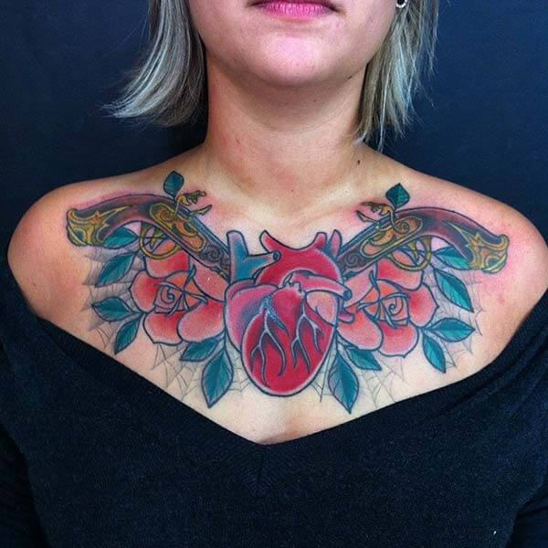 An overwhelming heart tattoo design on chest for women