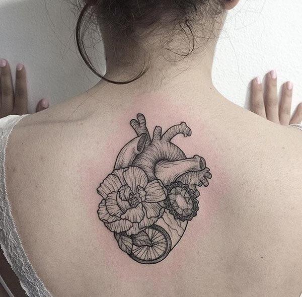 An attractive heart tattoo design on back for girls and ladies