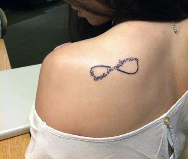An impressive infinity tattoo design on back shoulder for women