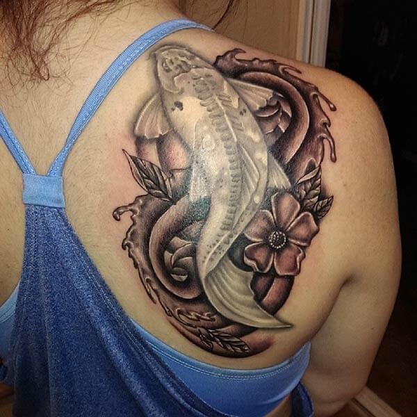 A stunning Koi Fish tattoo design on back shoulder for Women