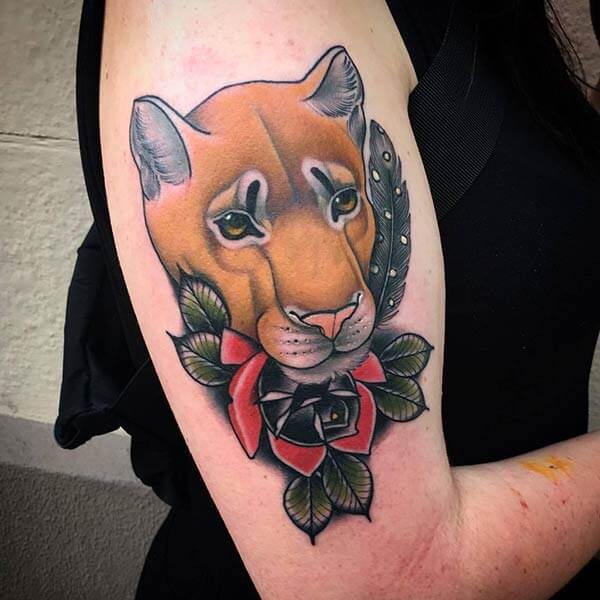 An adorable lion tattoo design on arm for ladies