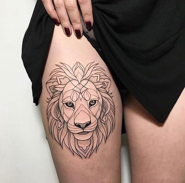 A wonderful lion tattoo design on thigh for girls