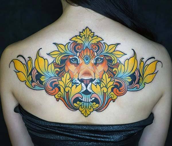 A gorgeous lion tattoo design on back for girls and ladies