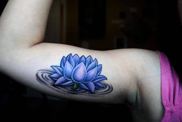 A magical lotus flower tattoo design on arm for girls