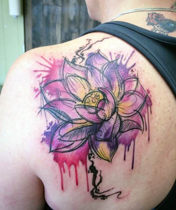 A vivid lotus tattoo design on back shoulder for Women
