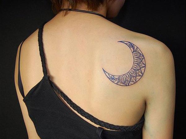 A lovely moon tattoo design on back shoulder for Girls