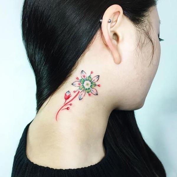 A catchy neck tattoo design for ladies