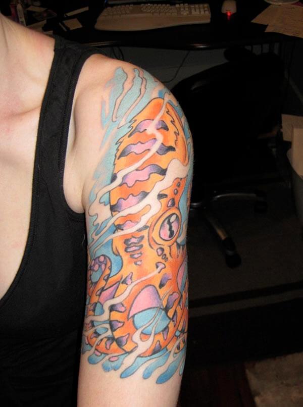 Awesome octopus tattoo design on upper arm for girls