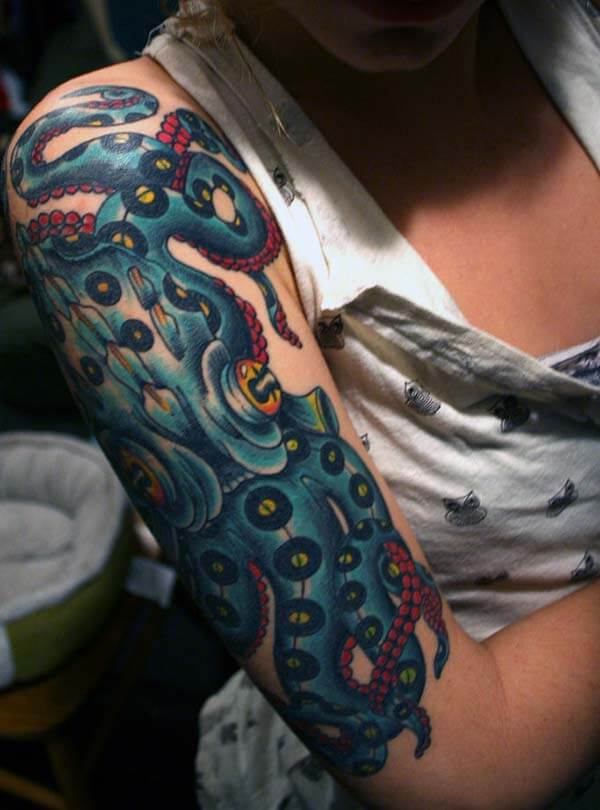 A spellbinding octopus tattoo design on upper arm for Women
