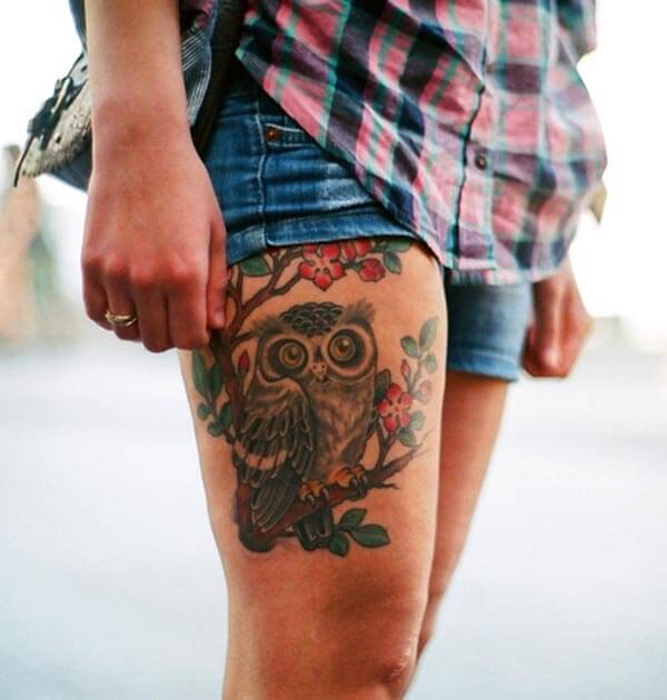 An adorable owl tattoo design on thigh for Girls and ladies