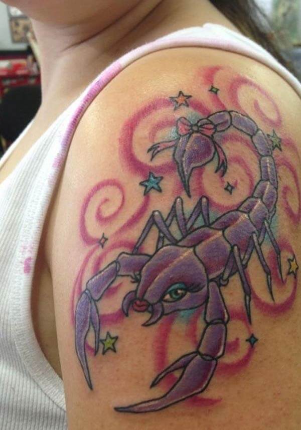 A beautiful scorpion tattoo design on upper arm for Ladies